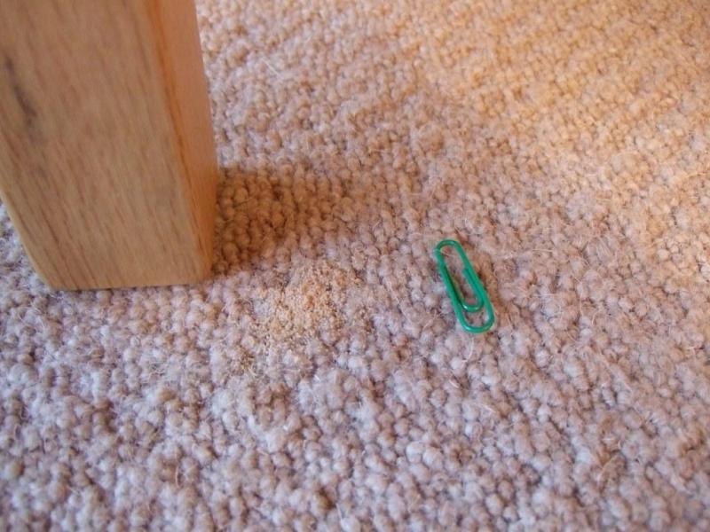 sawdust under hole in chair