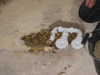 Shingle backfill to waste traps & pipe