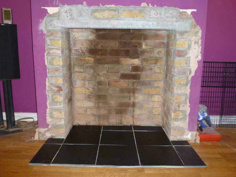 Slate hearth tiles.