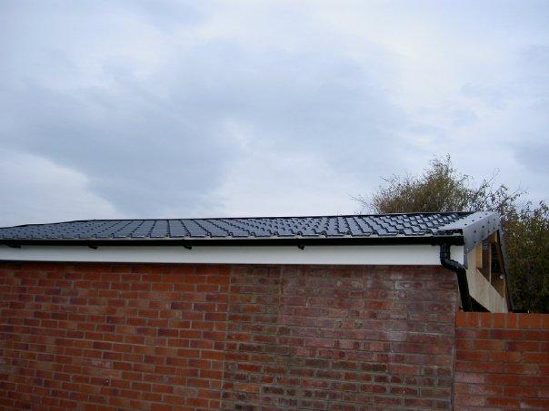 Steel tile effect roofing