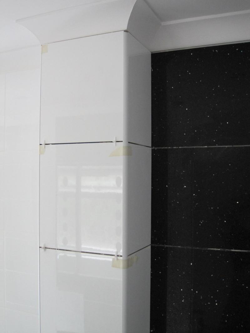 Tiling around stink pipe enclosure