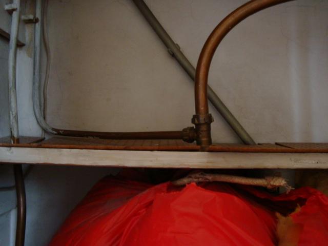 top of cylinder with vent to loft