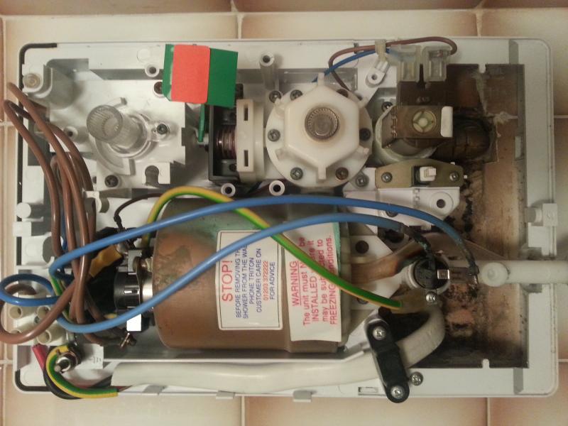 Triton t80 shower with scorched and melted blue wi