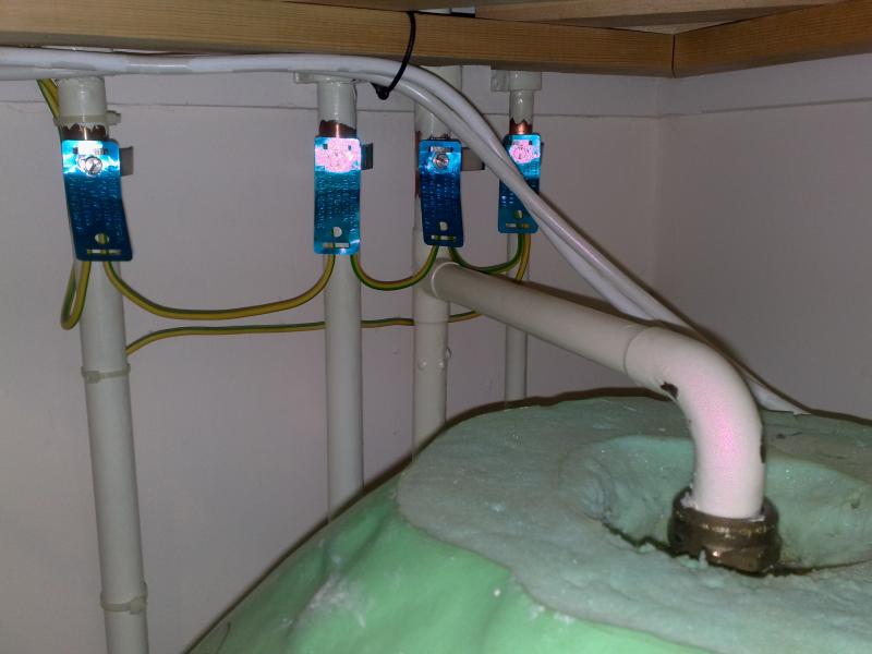 Uninsulated pipes at top of cylinder