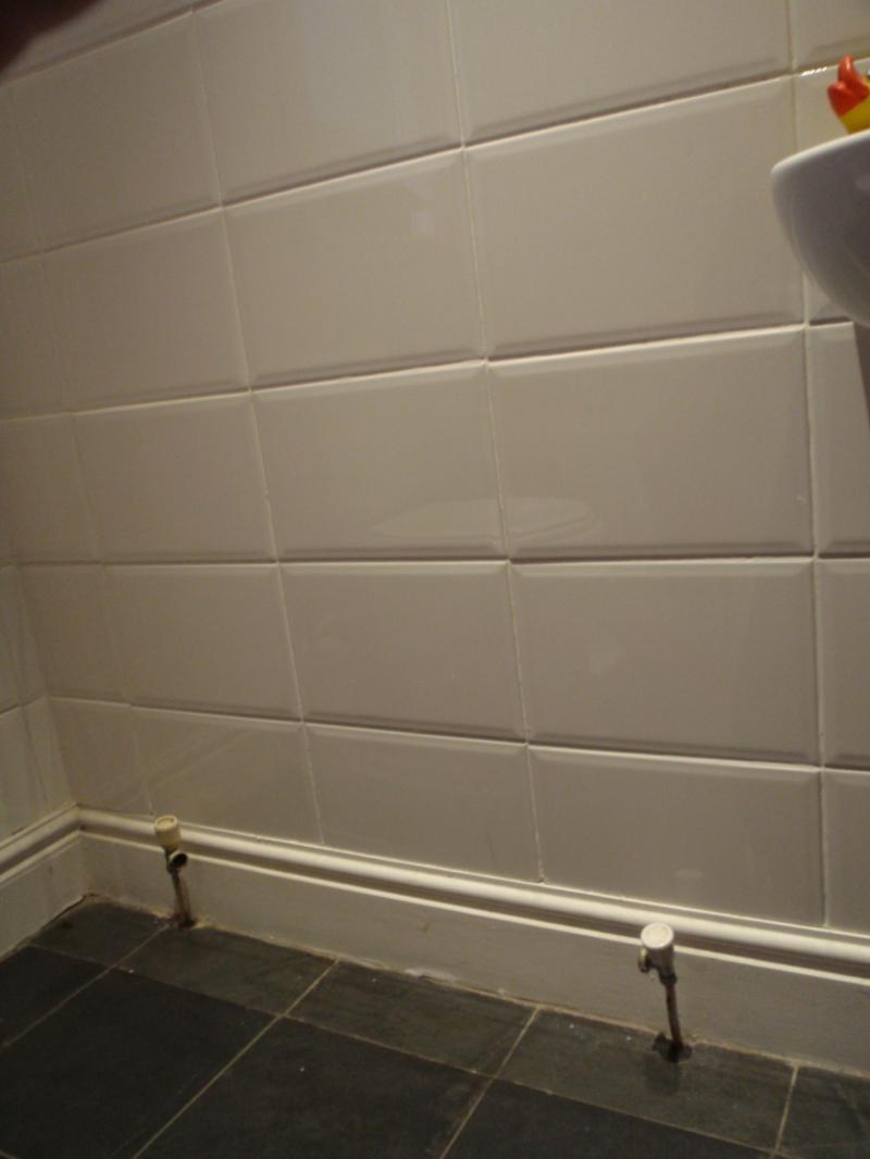 Installing Towel Radiator On Pipe 708mm, How To Cut Tiles Around Radiator Pipes
