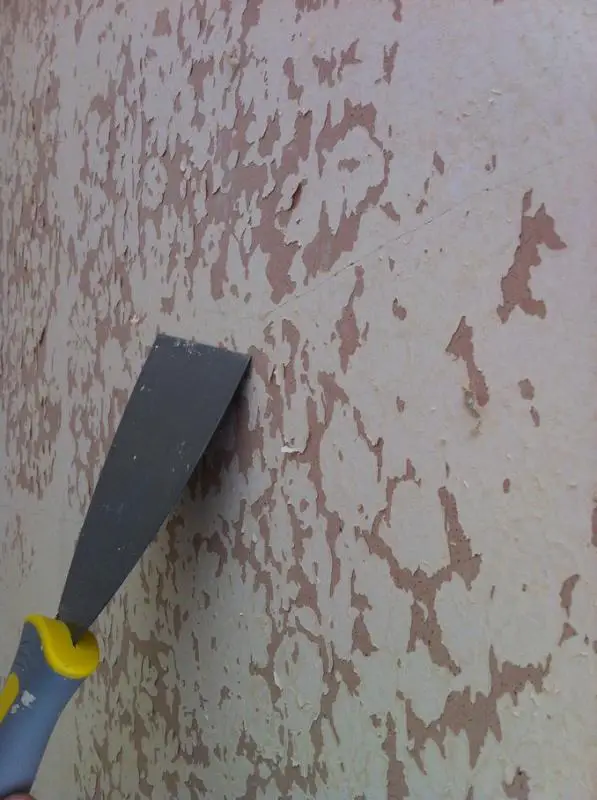 Painting over flaking wallpaper primer