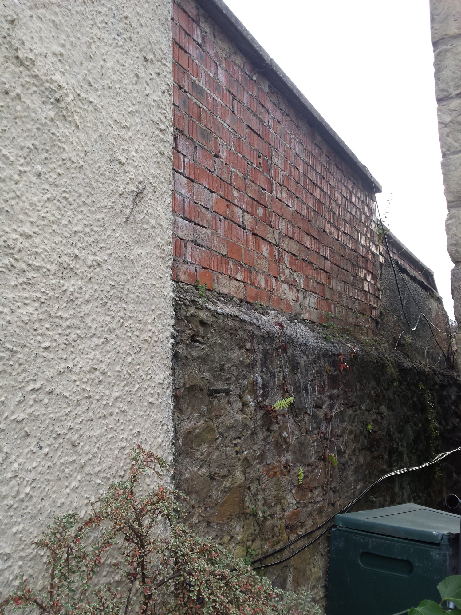 wall to west side of extension