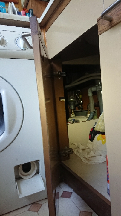 Washing machine with waste pipe