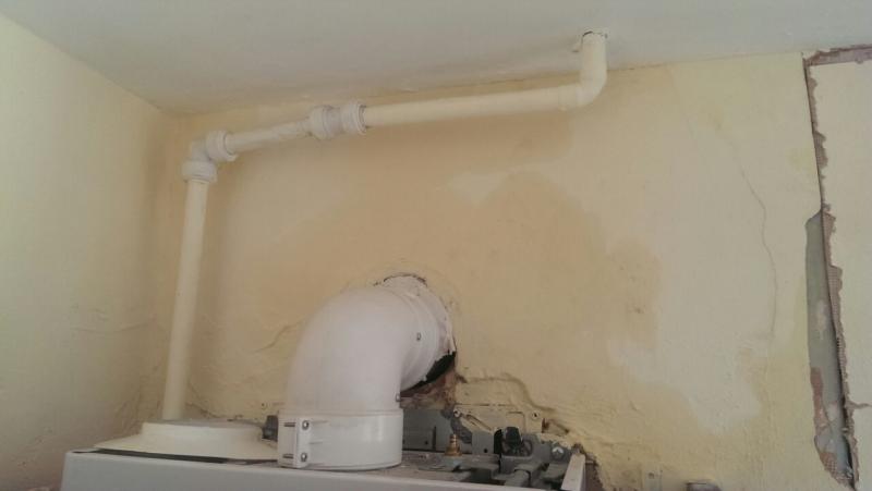 Wet patch around flue.